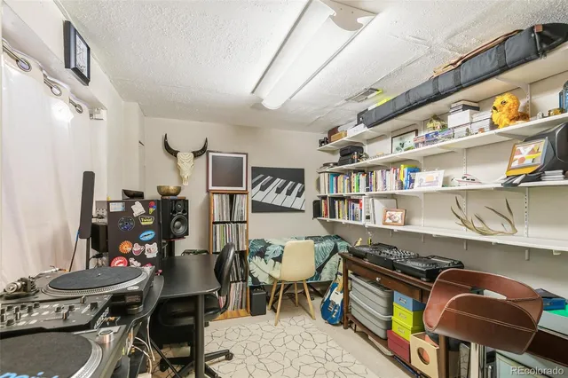 a view of a workspace with furniture