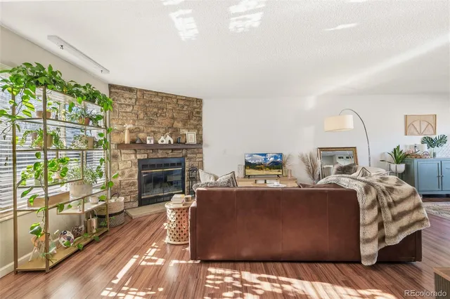 a bed room with a bed and a fireplace