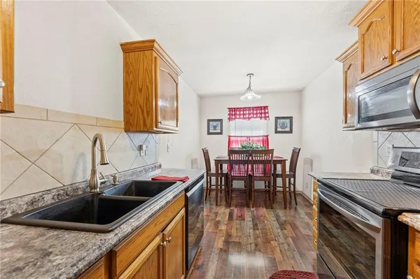 $214,900 | 1308 Northwest Ashley Drive, Grain Valley, MO 64029