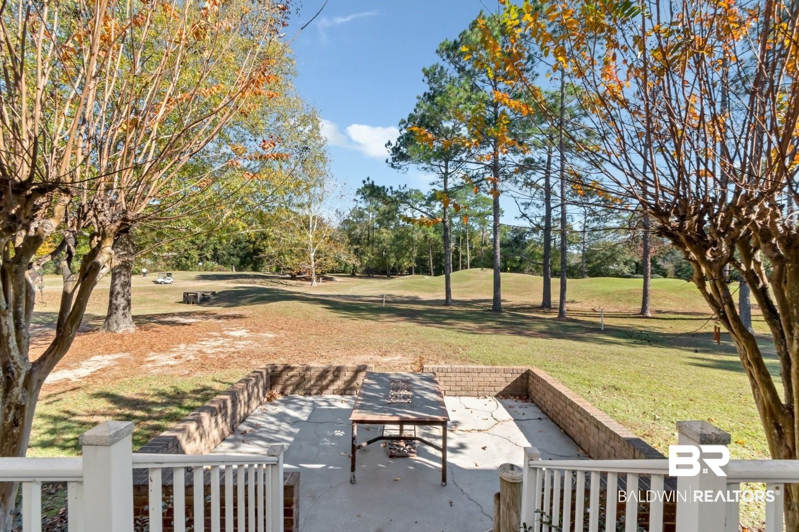 9905 Carnoustie Court Foley, AL 36535 - Photo 26 of 31 View of grassy yard featuring a patio area