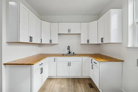 a bathroom with a shower and a toilet