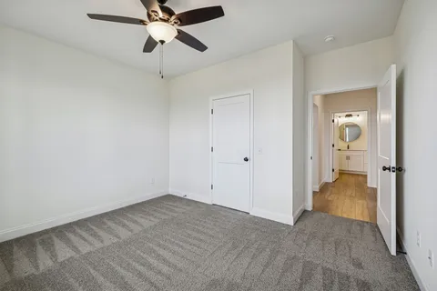 a view of a room with a big yard