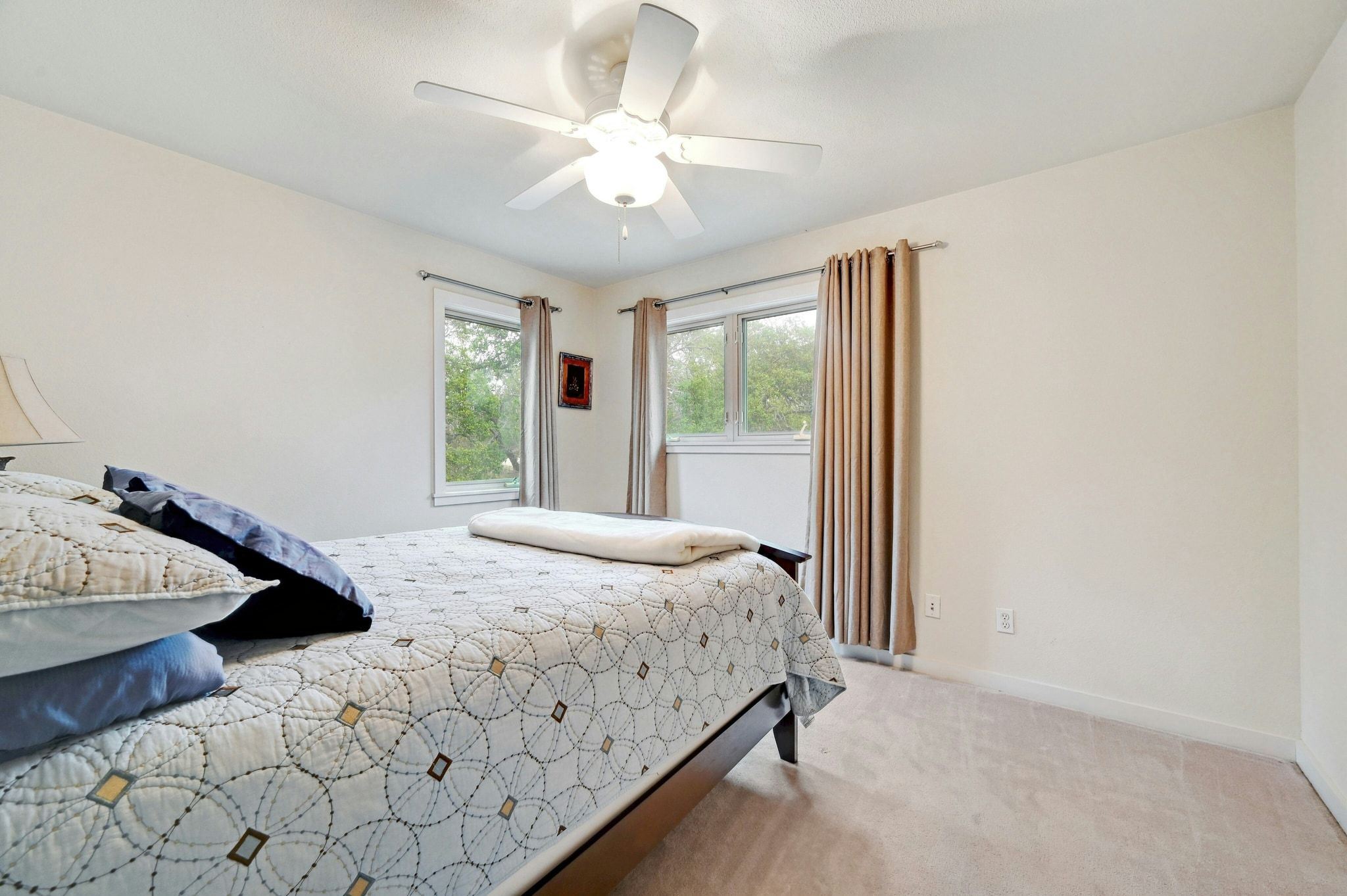 2147 Tejas Trail Blanco, TX 78606 - Photo 19 of 29 a bedroom with a bed and a window