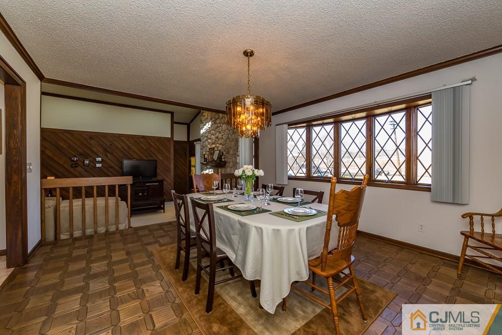 53 Rector Avenue Woodbridge, NJ 07095 - Photo 11 of 25 a view of a dining room with furniture window and outside view