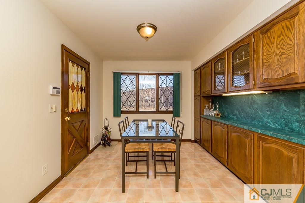 53 Rector Avenue Woodbridge, NJ 07095 - Photo 8 of 25 a living room with furniture and a window