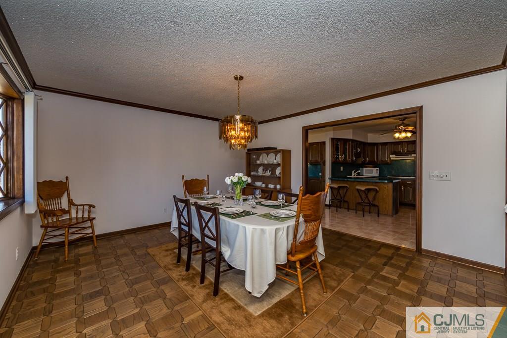 53 Rector Avenue Woodbridge, NJ 07095 - Photo 10 of 25 a dining room with furniture and window