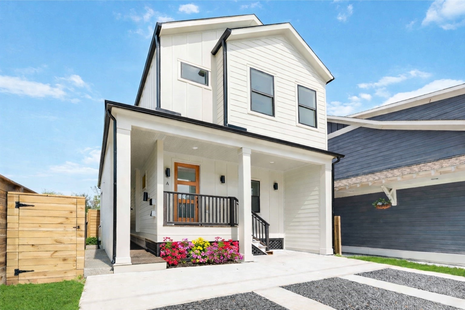 a front view of a house with a garage