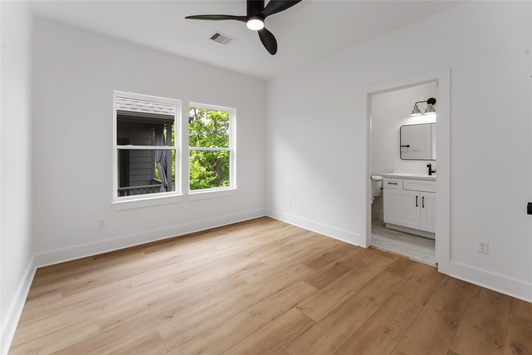 3520 Castor Street, Unit A B Houston, TX 77022 - Photo 35 of 47 wooden floor in an empty room with a window
