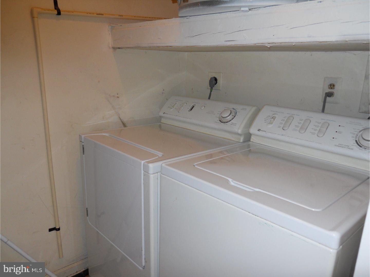 309 Headhouse Court Wayne, PA 19087 - Photo 11 of 16 a utility room with dryer and washer