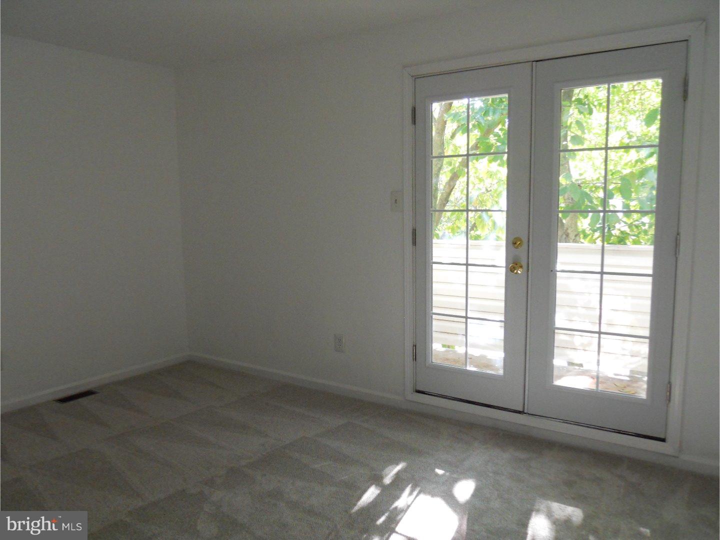 309 Headhouse Court Wayne, PA 19087 - Photo 14 of 16 an empty room with a empty space and a window