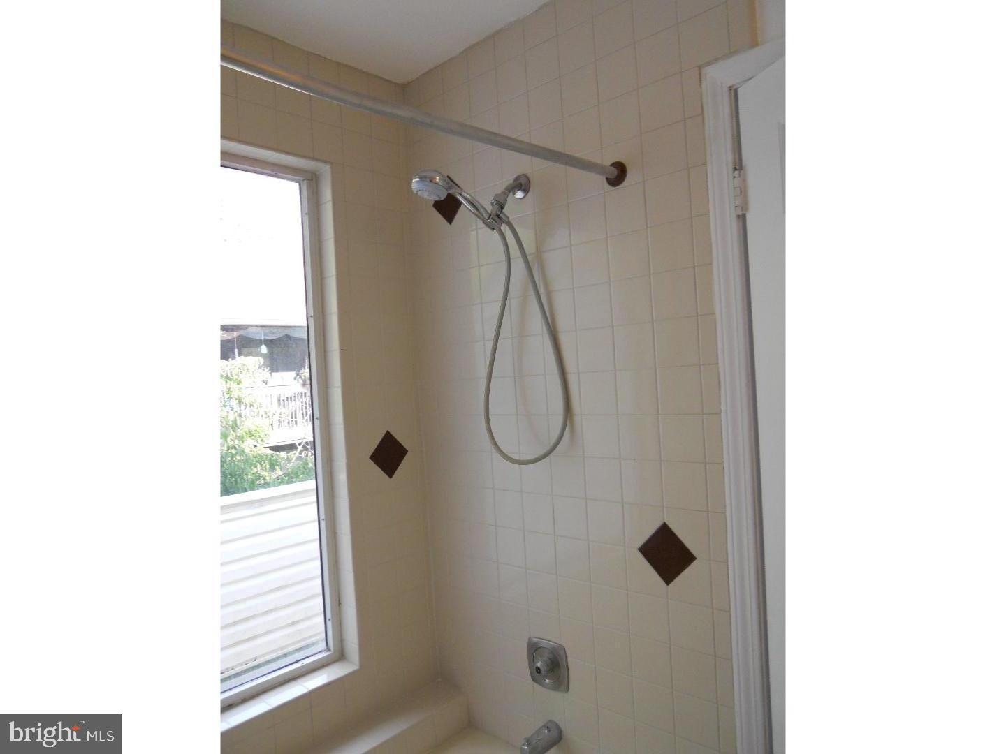 309 Headhouse Court Wayne, PA 19087 - Photo 16 of 16 a bathroom with a shower