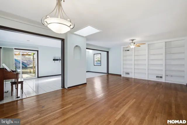 a view of a livingroom with wooden floor