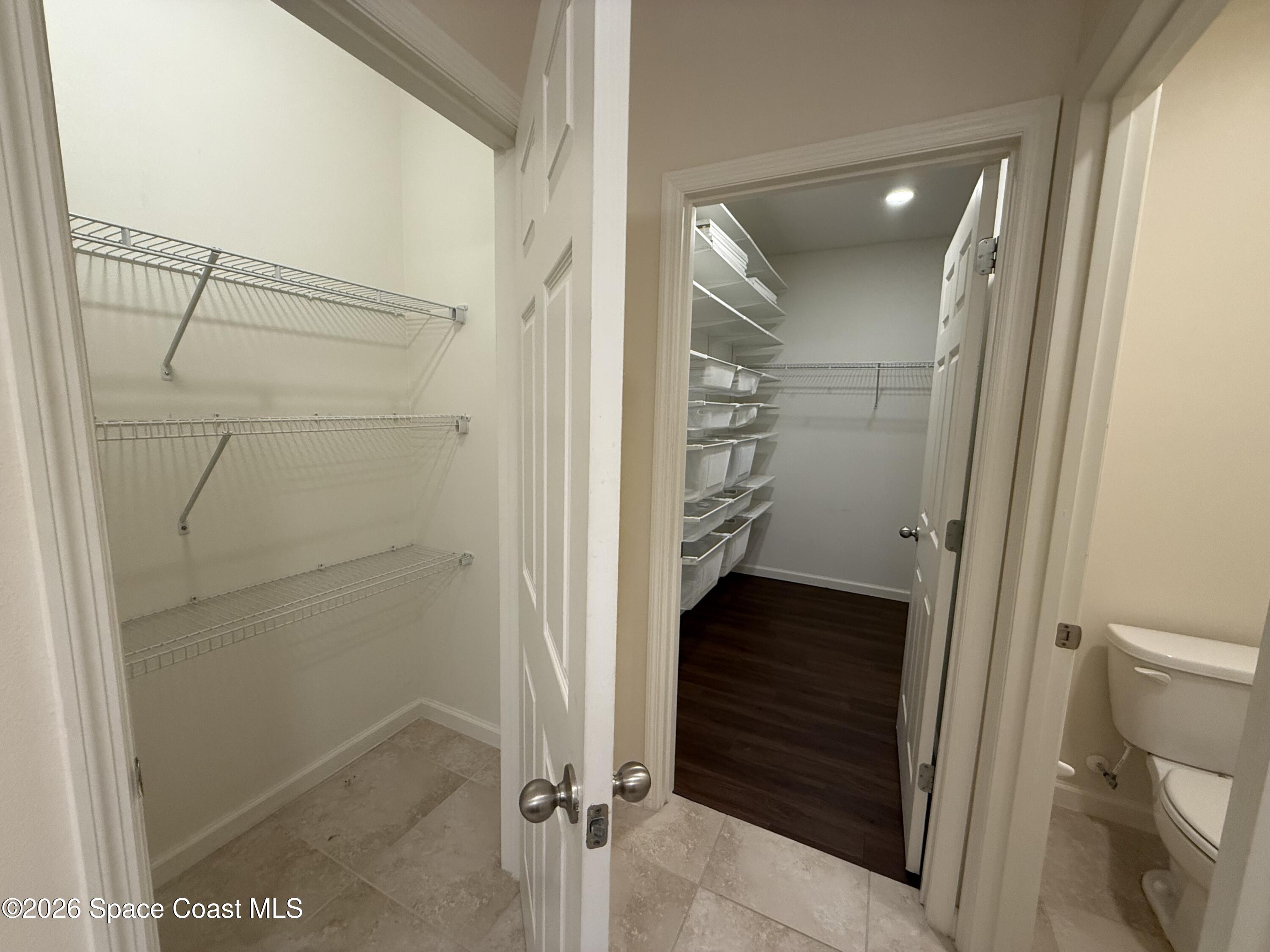 1070 Swiss Pointe Lane Rockledge, FL 32955 - Photo 17 of 18 a view of walk in closet