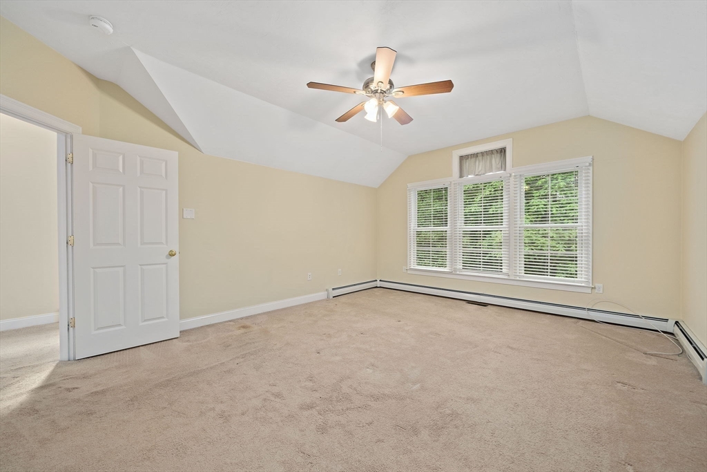 14 Sugar Maple Circle, Unit 14 Hanover, MA 02339 - Photo 24 of 38 a view of an empty room with a window