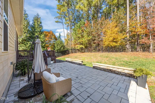 a view of house with yard