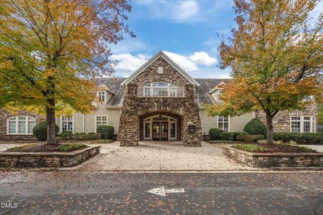 an aerial view of a house with outdoor space