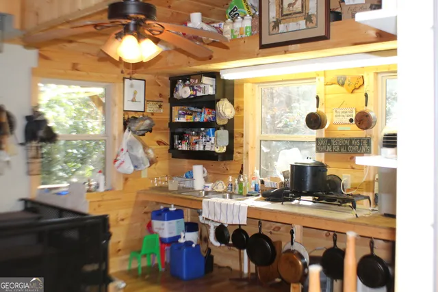 a view of a lake with a yard