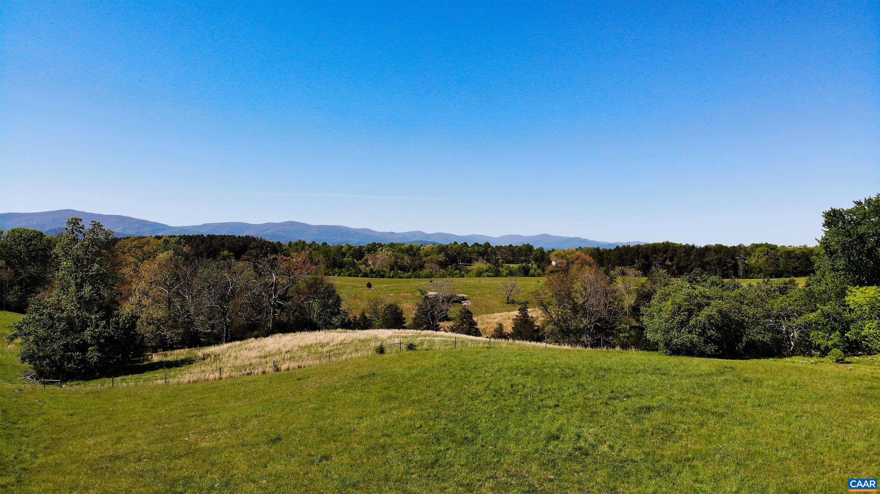 Lot 6 Advance Mills Road Ruckersville, VA 22968 - Photo 3 of 10 a view of lake and mountain
