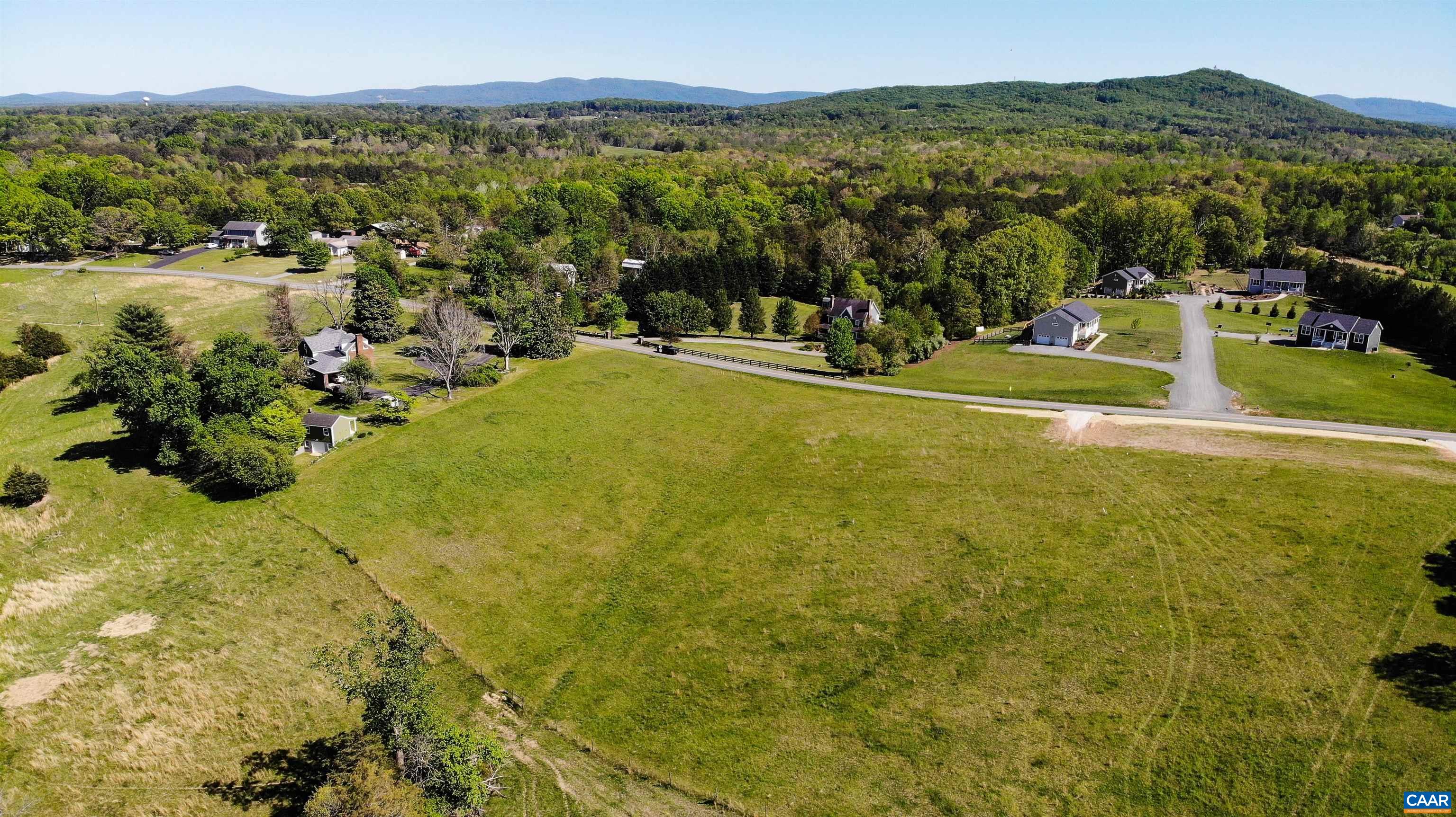 Lot 6 Advance Mills Road Ruckersville, VA 22968 - Photo 4 of 10 a view of a lake with a mountain