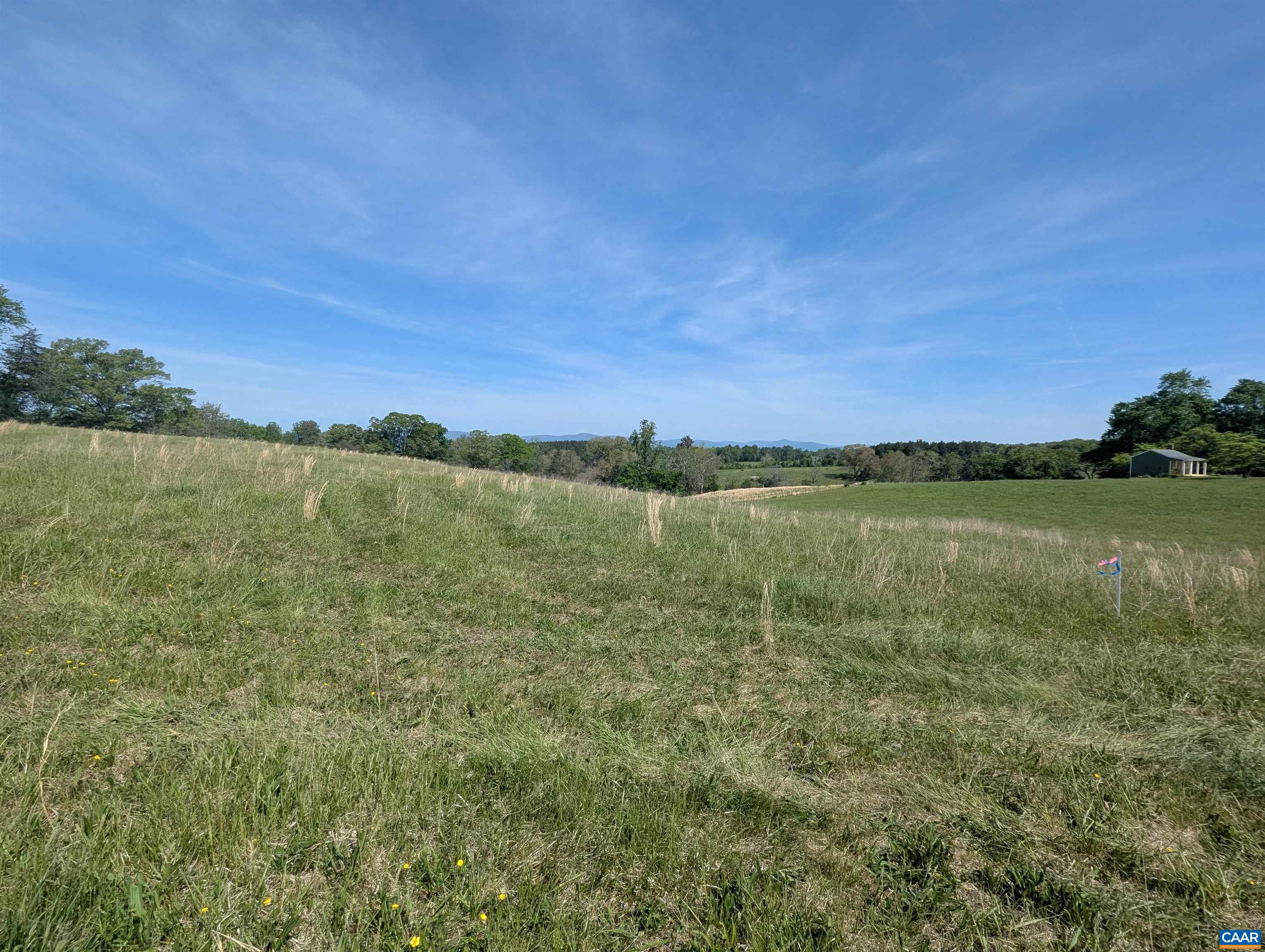 Lot 6 Advance Mills Road Ruckersville, VA 22968 - Photo 10 of 10 a view of a lake with houses in the background