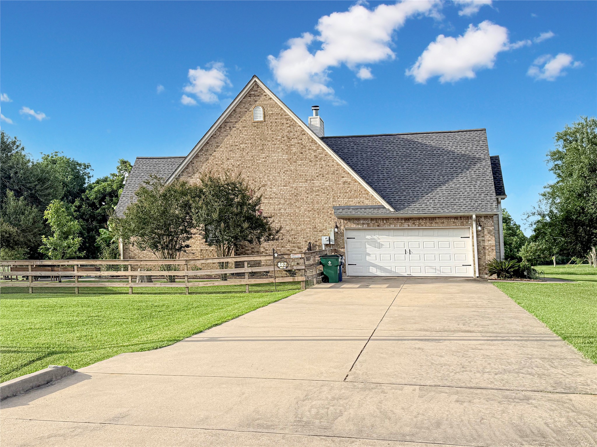 807 Mill Road Angleton, TX 77515 - Photo 39 of 46 Oversized side-entry two-car garage offers exceptional space for vehicles and storage.
