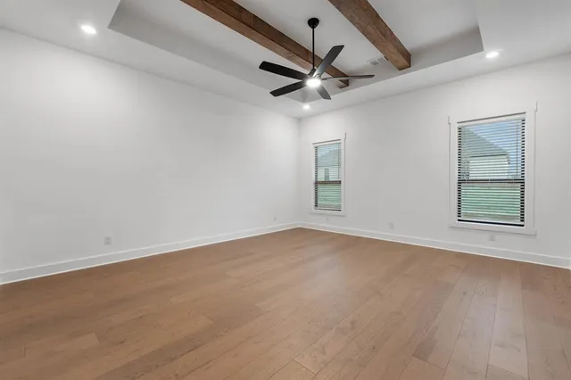 a view of a kitchen with a sink and a fireplace