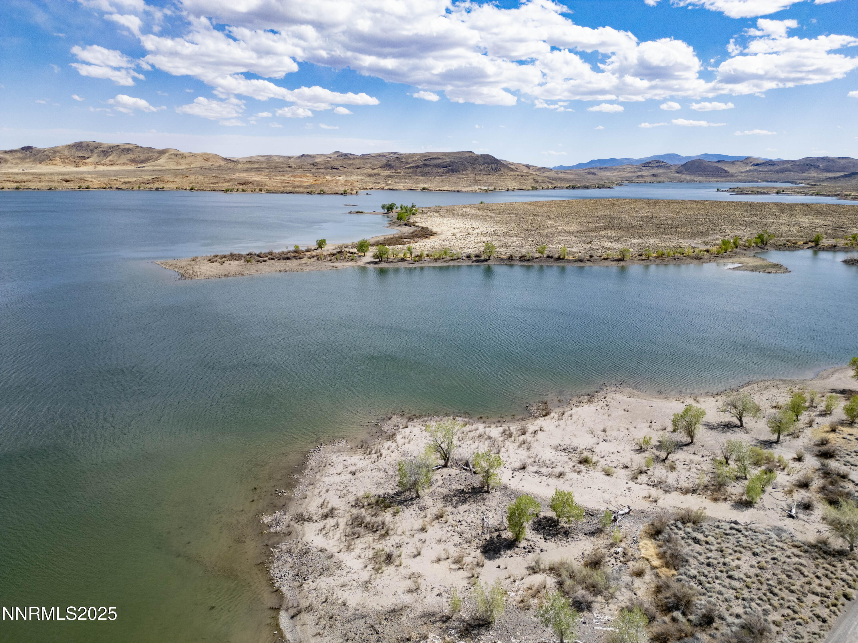 20144 Lahontan Dam Road Fallon, NV 89406 - Photo 17 of 35 a view of a lake with a mountain
