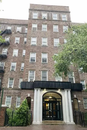a front view of a building with balcony