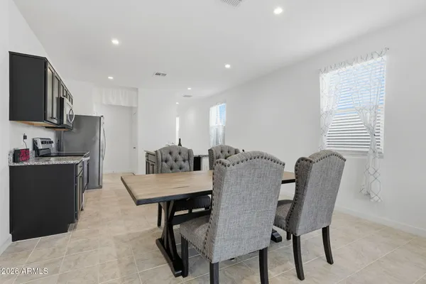 a view of a dining room with furniture