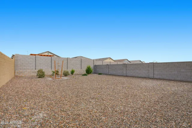 a living room with fireplace furniture and a flat screen tv