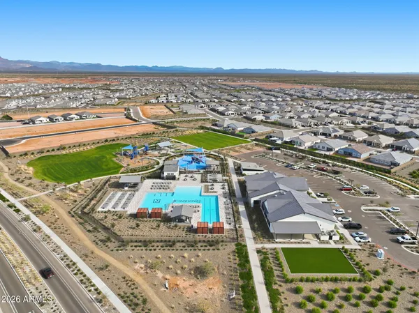 a view of balcony and a floor to ceiling window