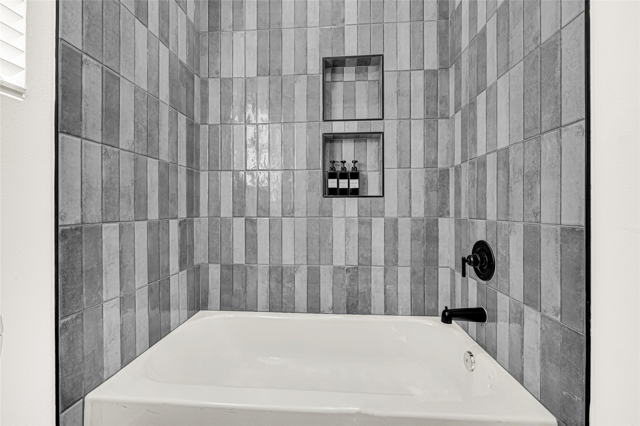 4201 Stassen Street Houston, TX 77051 - Photo 30 of 39 a bathroom with a bathtub and shower