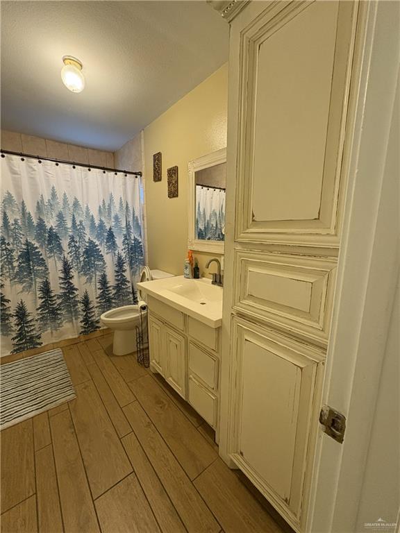 116 North Lupe Street Rio Grande City, TX 78582 - Photo 20 of 24 a bathroom with a sink a bathtub and a shower