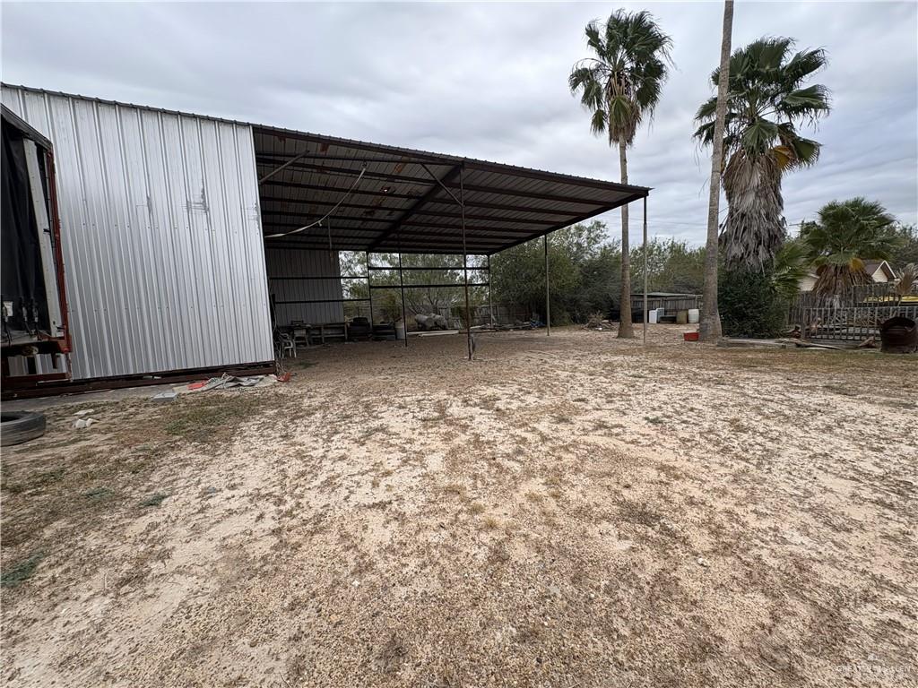 116 North Lupe Street Rio Grande City, TX 78582 - Photo 4 of 24 a view of a backyard of a house