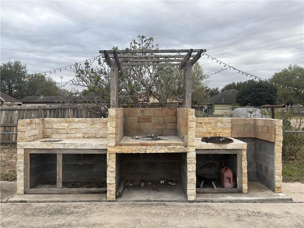 116 North Lupe Street Rio Grande City, TX 78582 - Photo 6 of 24 a view of a terrace with a lake