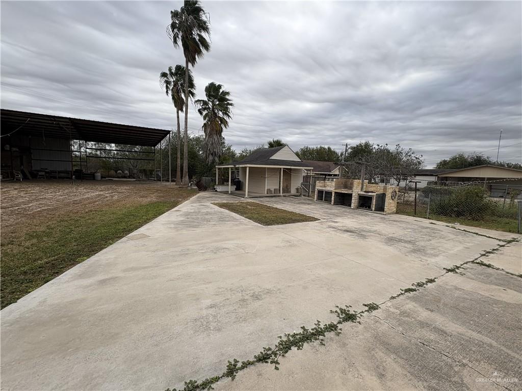 116 North Lupe Street Rio Grande City, TX 78582 - Photo 8 of 24 a view of a house with a yard