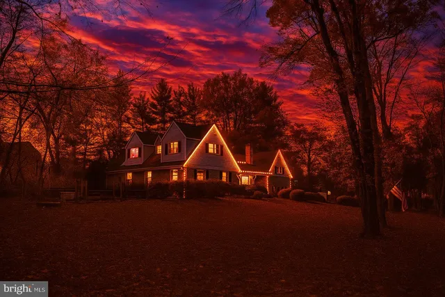a house with trees in the background