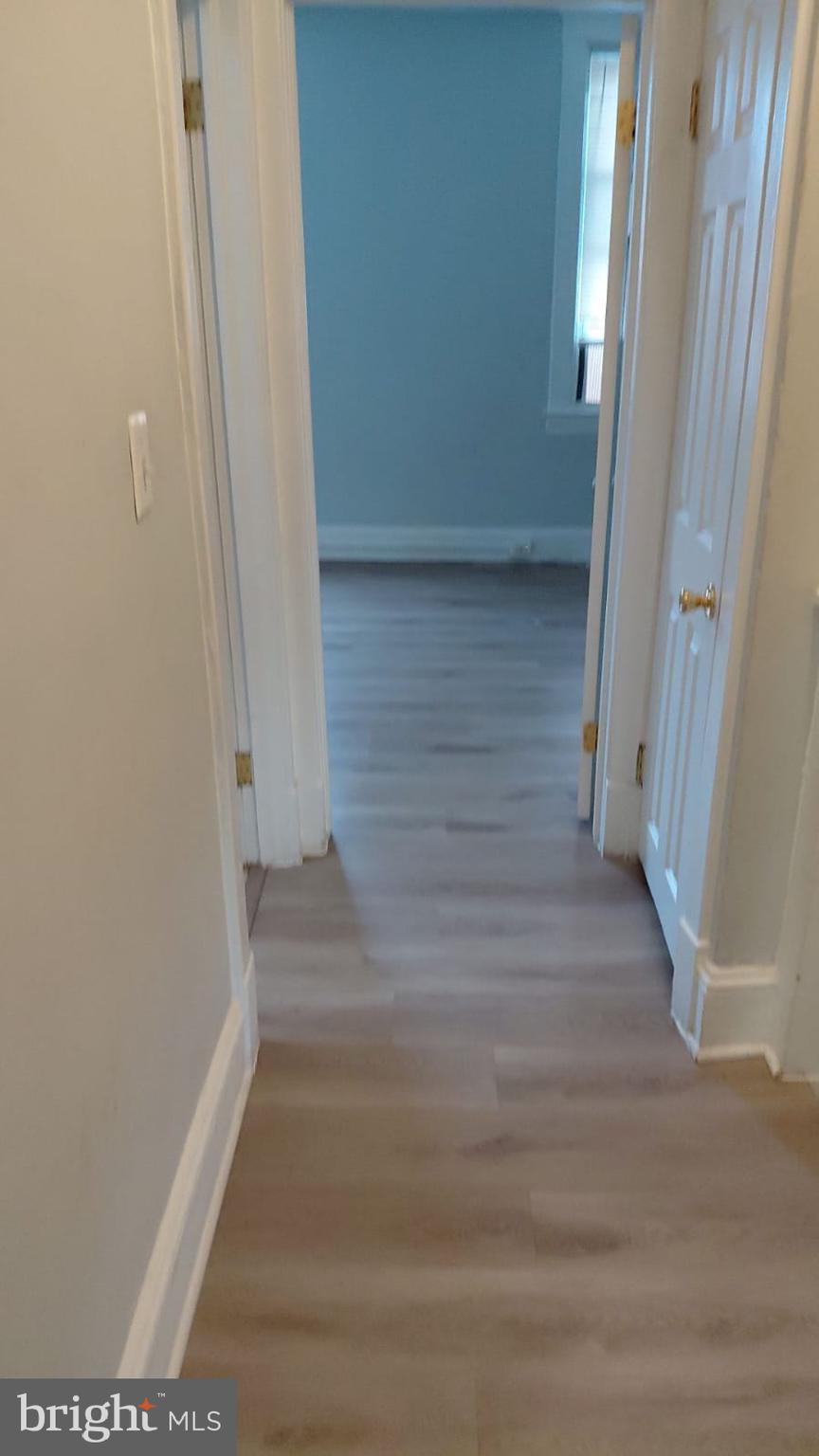 2518 Barclay Street Baltimore, MD 21218 - Photo 4 of 16 a view of staircase with white walls