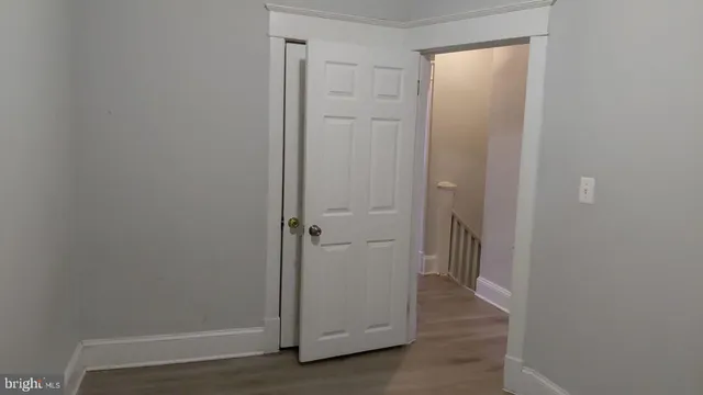 a view of a hallway with closet area