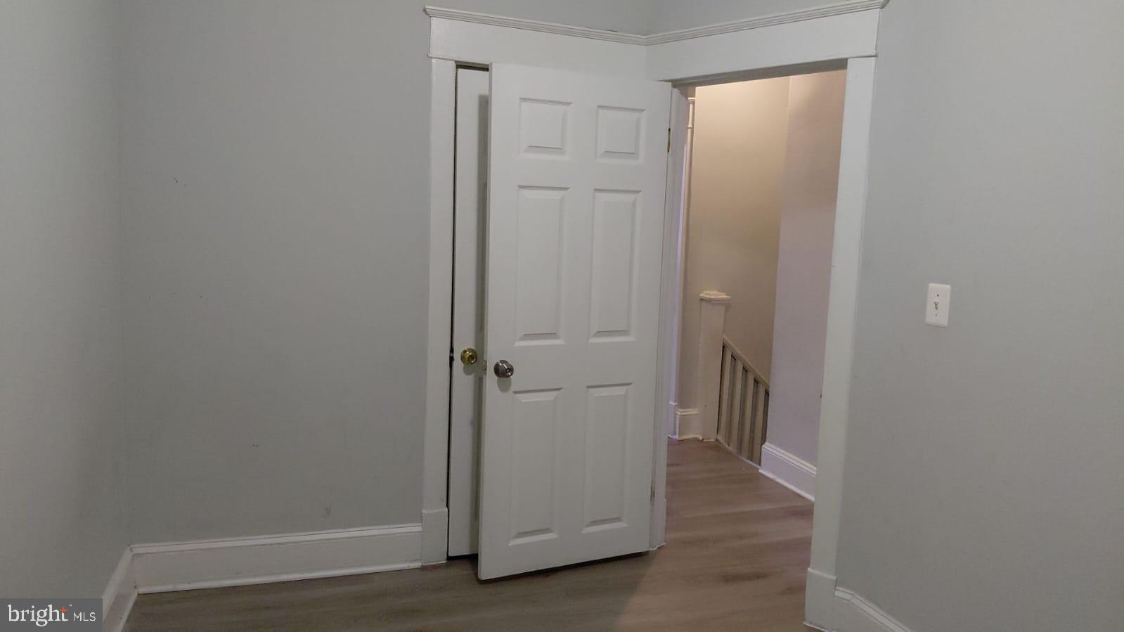 2518 Barclay Street Baltimore, MD 21218 - Photo 5 of 16 a view of a hallway with closet area