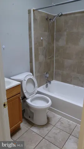 a view of a hallway view with wooden floor and staircase