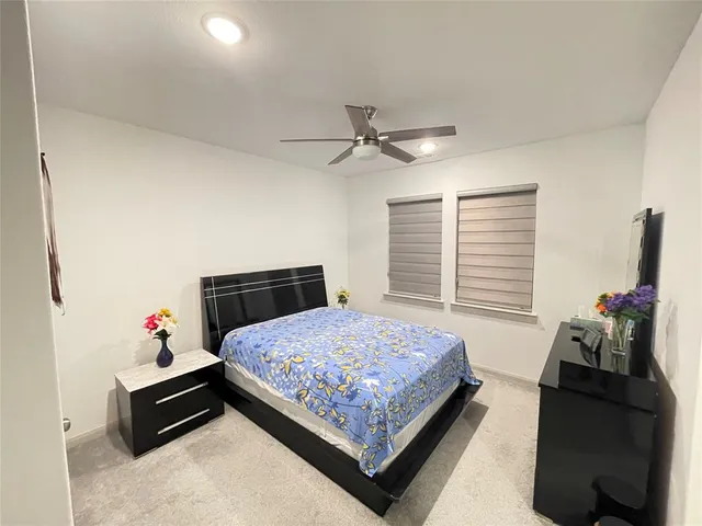 a view of a hallway with a window