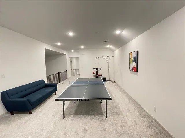 a bathroom with sink a mirror and a shower