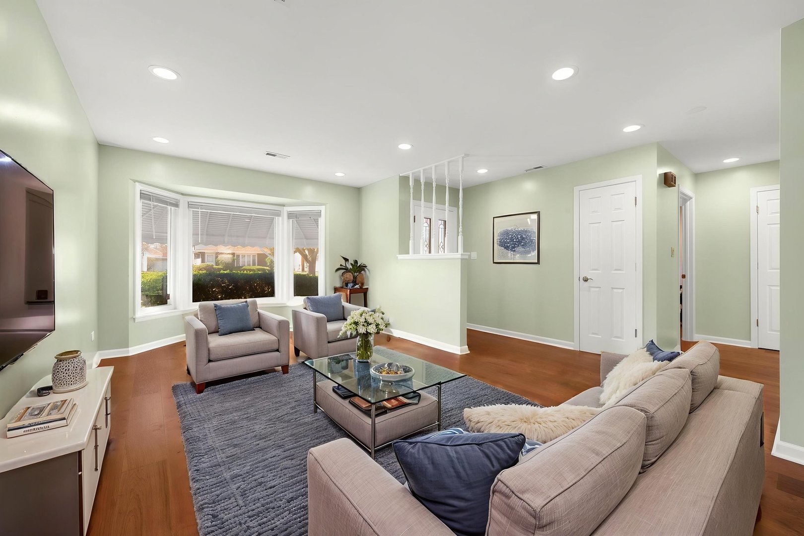 4433 Madison Avenue Brookfield, IL 60513 - Photo 2 of 16 a living room with furniture and a flat screen tv