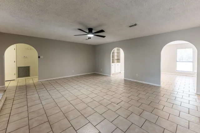 a view of an empty room and window