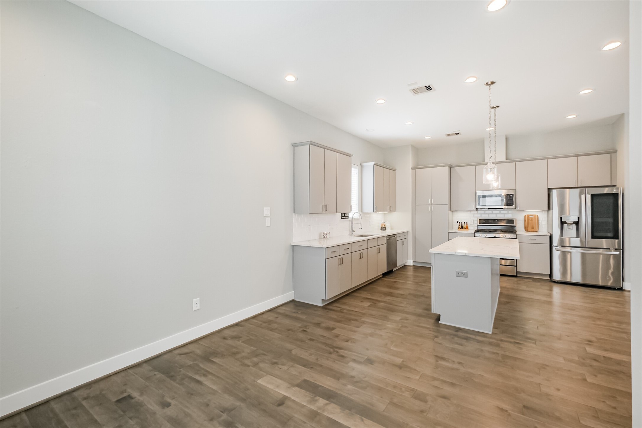 1305 Mayfair Clarkson Lane Houston, TX 77055 - Photo 16 of 34 Additional view of the kitchen area, with plenty of space for a formal dining area.