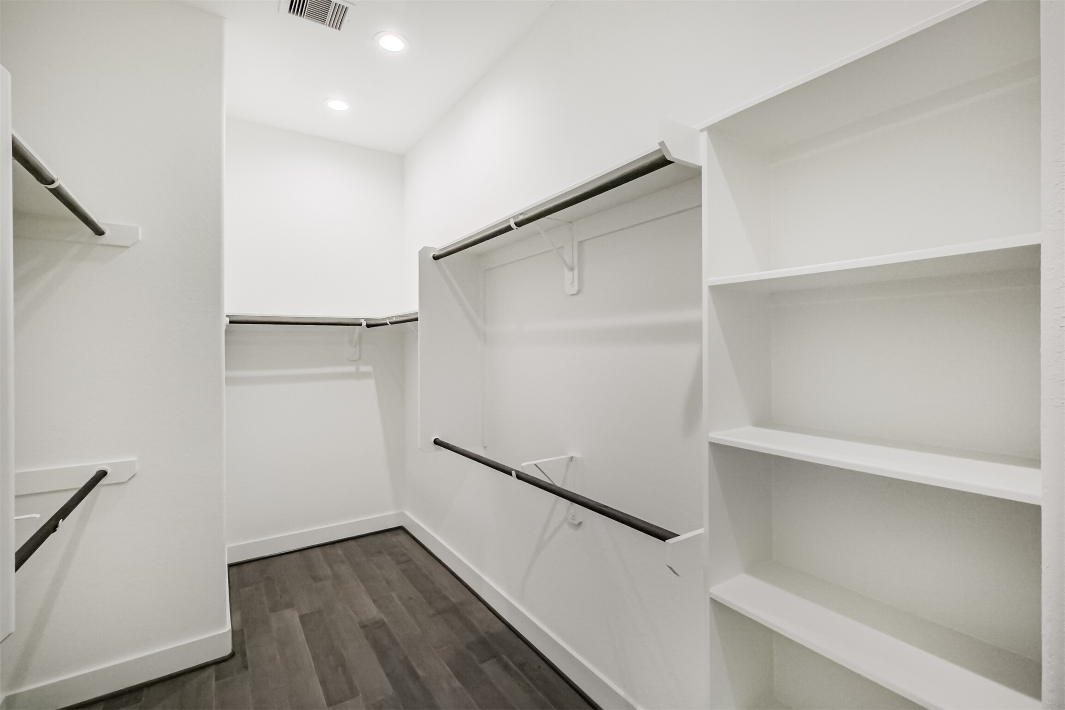 1305 Mayfair Clarkson Lane Houston, TX 77055 - Photo 24 of 34 Oversized primary walk in closet with plenty of built-in storage.