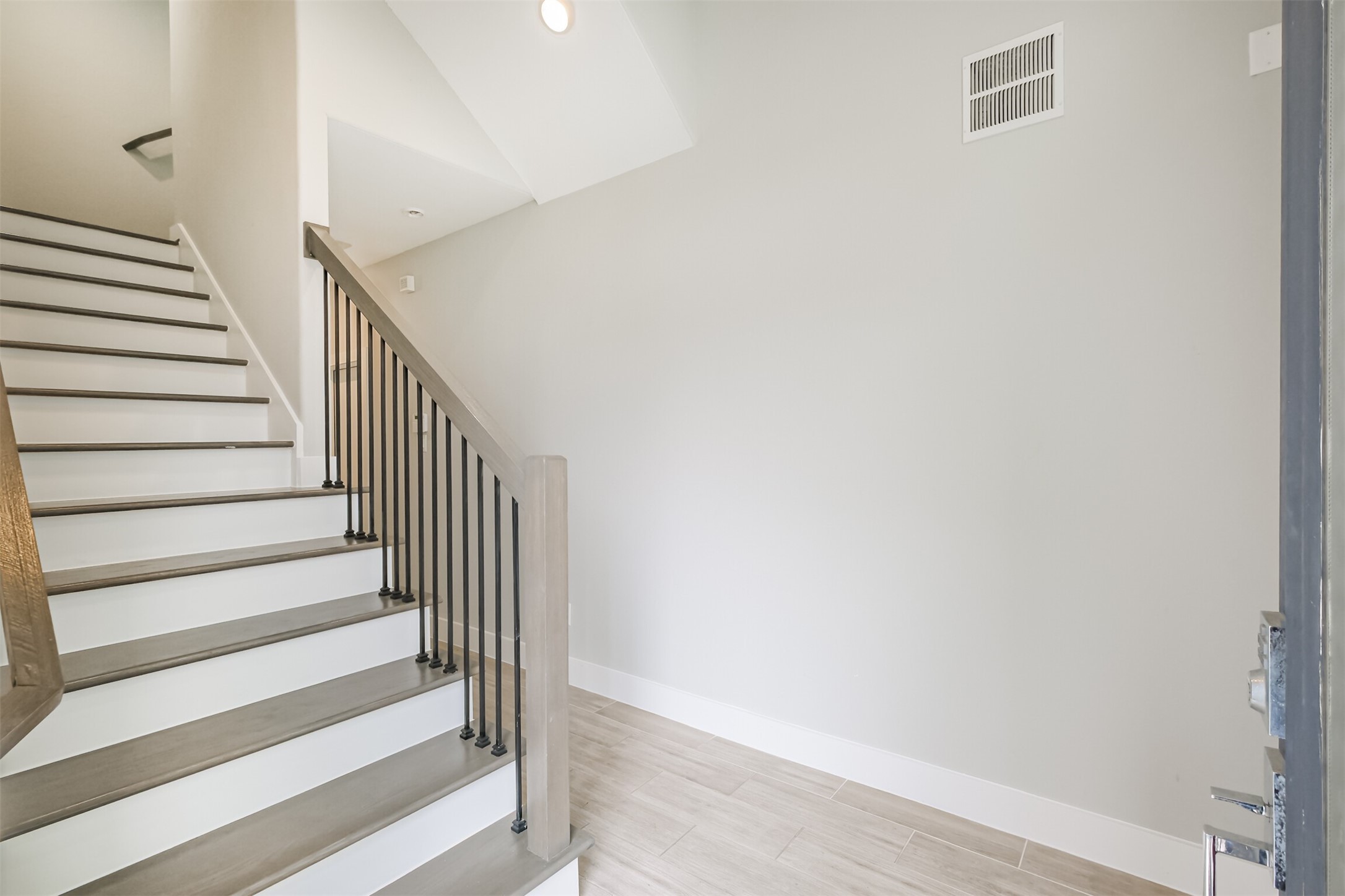 1305 Mayfair Clarkson Lane Houston, TX 77055 - Photo 5 of 34 Decadent wide stairs from the front door up to the 2nd floor.