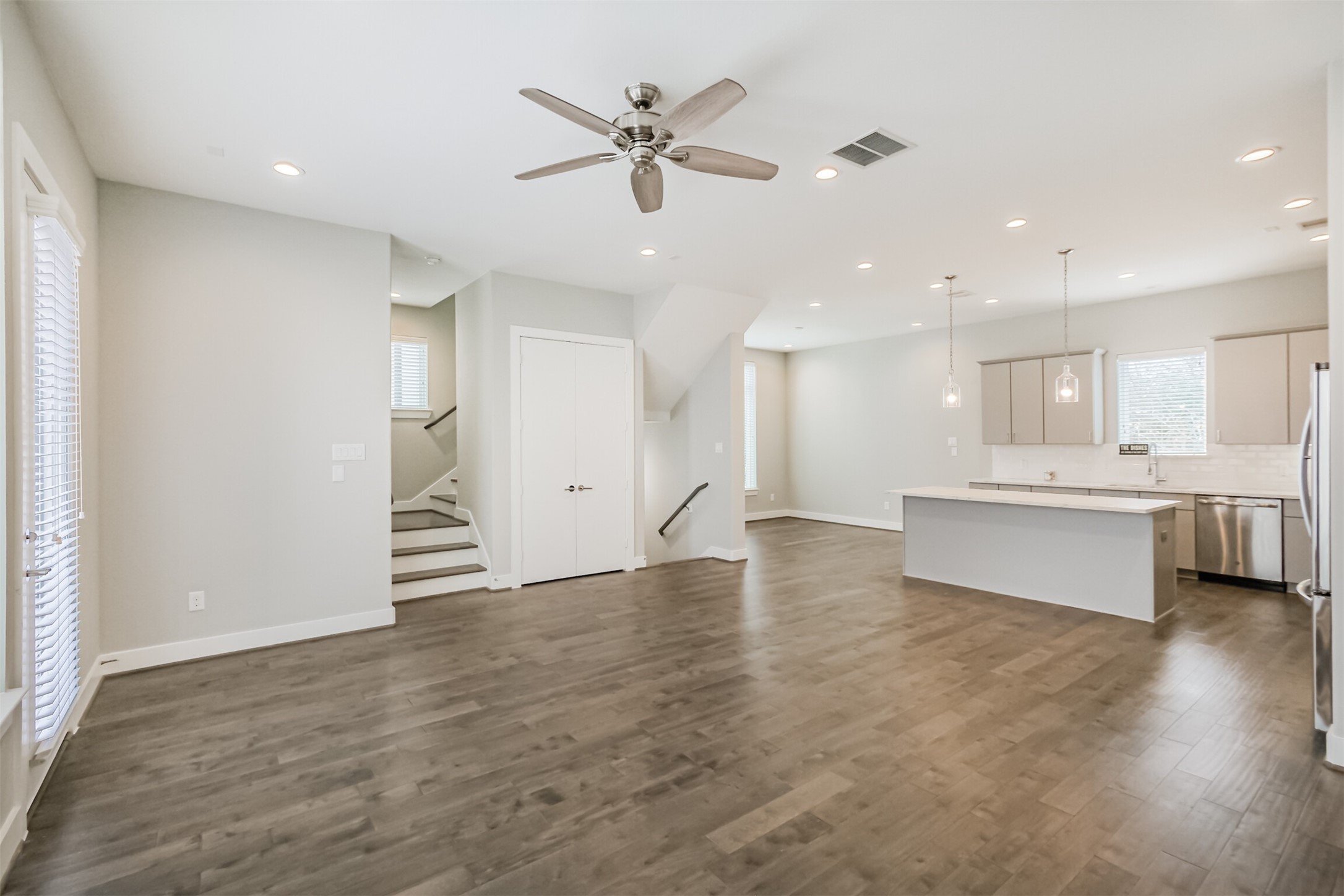 1305 Mayfair Clarkson Lane Houston, TX 77055 - Photo 8 of 34 Enjoy wooden floors throughout the home.