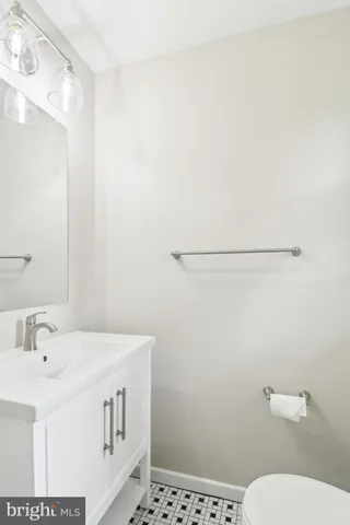 a view of an empty room and wooden floor